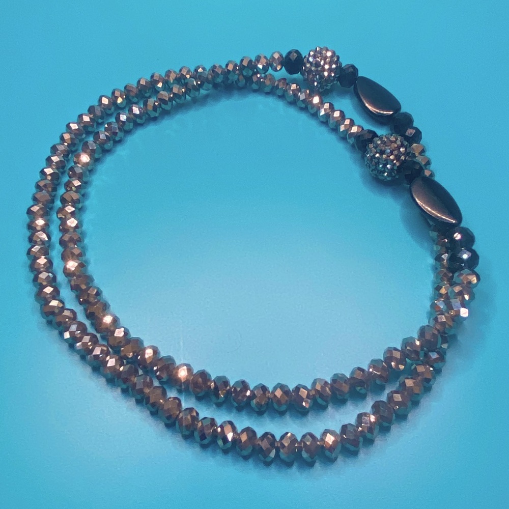 Silver and black sparkle necklace.